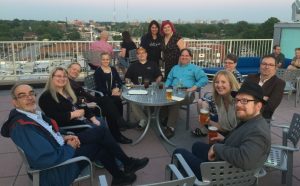 Some of our CosmoQuest team, enjoying a break in the weather on the roof of the Moonrise Hotel. Credit: Michelle Higgins