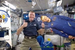ESA Astronaut Tim Peak and "Flat Tim." Credit: ESA