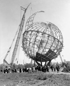  New York World's Fair, 1964 A crane eases the last segment of the iconic stainless steel Unisphere into place. Credit: Tom Gallagher, New York Times