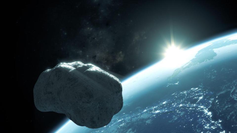 A rock in space above a planet