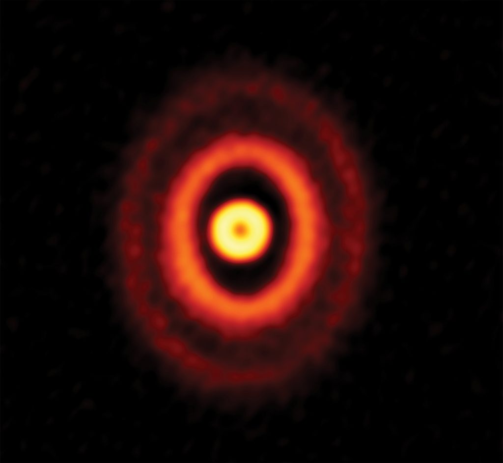 Misaligned Rings in Planet-Forming Disk Around Triple Stars