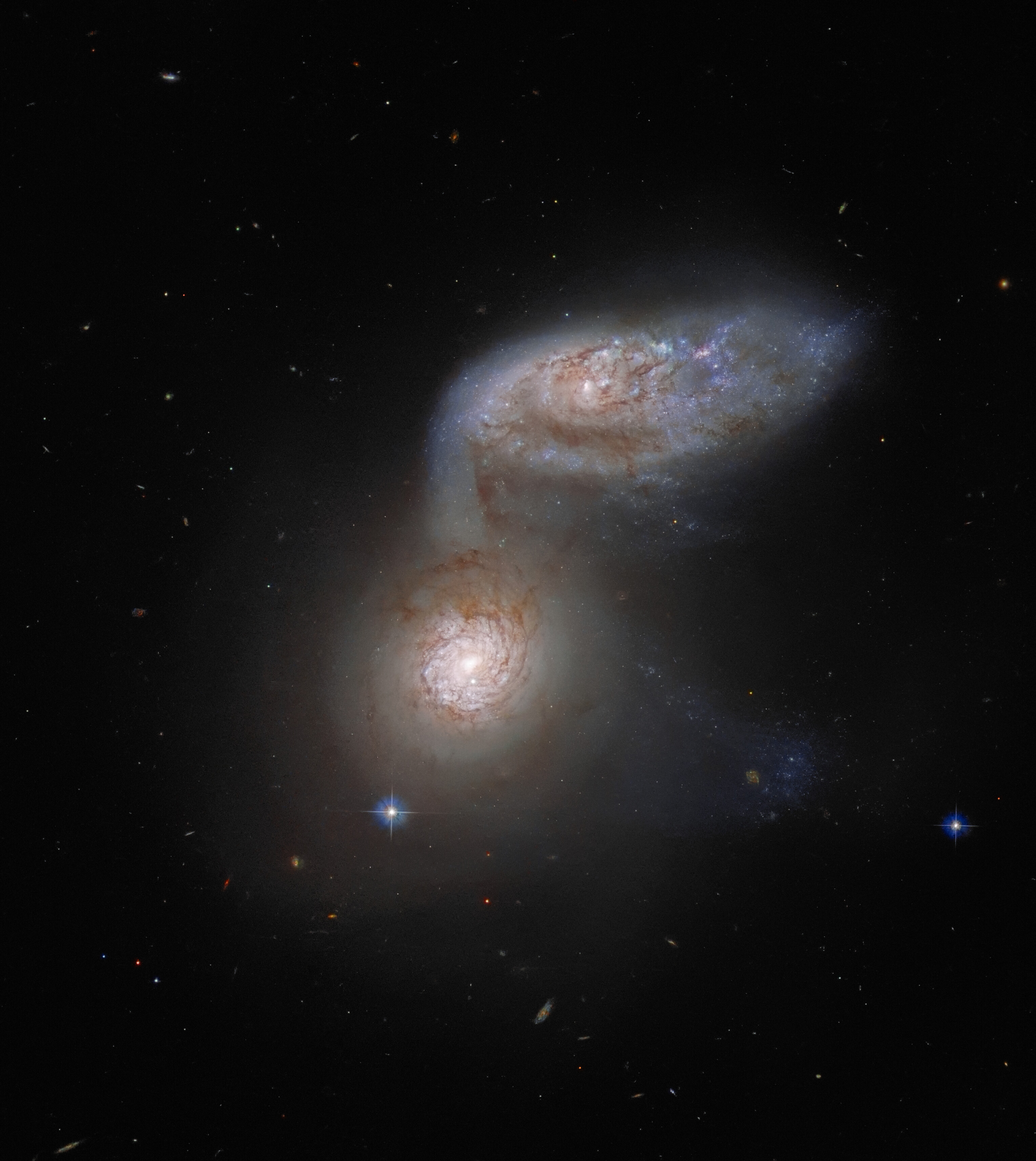 Galaxies Lose Structure in One Another’s Arms