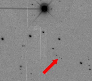 Three images of asteroid 2016 XA2. We track on the moving asteroid so the star images are elongated. With three separate exposures we can see the motion of the asteroid relative to the “fixed” stars. Credit: Dave Bell and Larry Lebofsky.